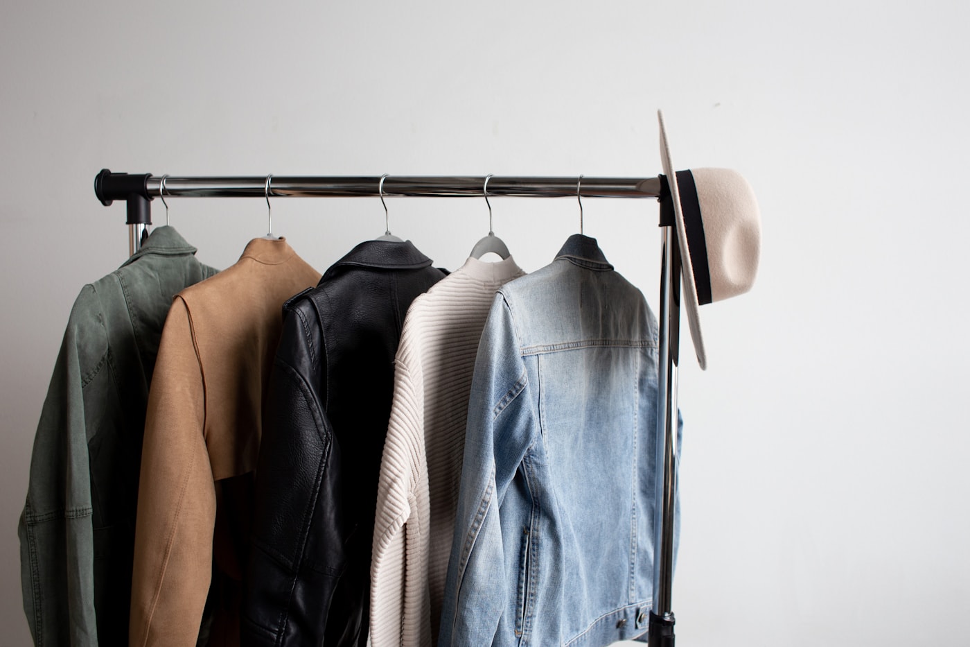 Denim jacket layered over a casual dress